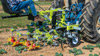 steerable cultivator with parallel linkage finger weeders and a-blades