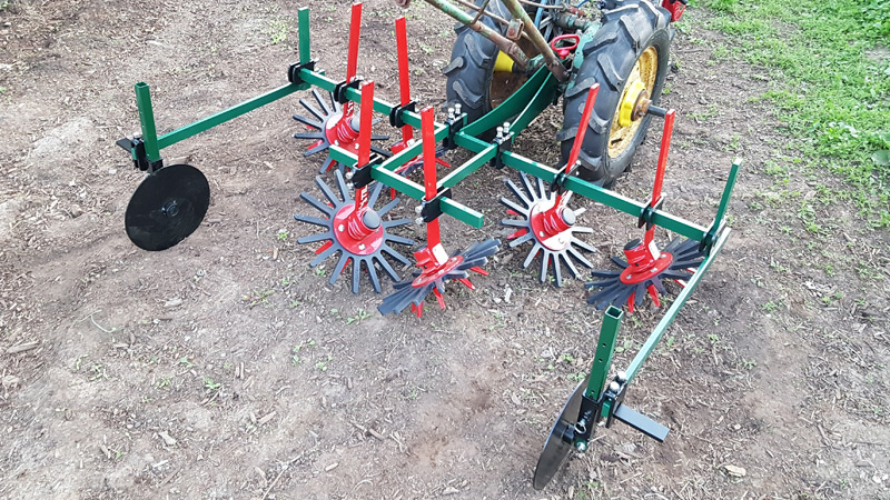 3 Row Finger Weeder on Walk Behind Tractor 3 Row Finger Weeder on Walk Behind Tractor